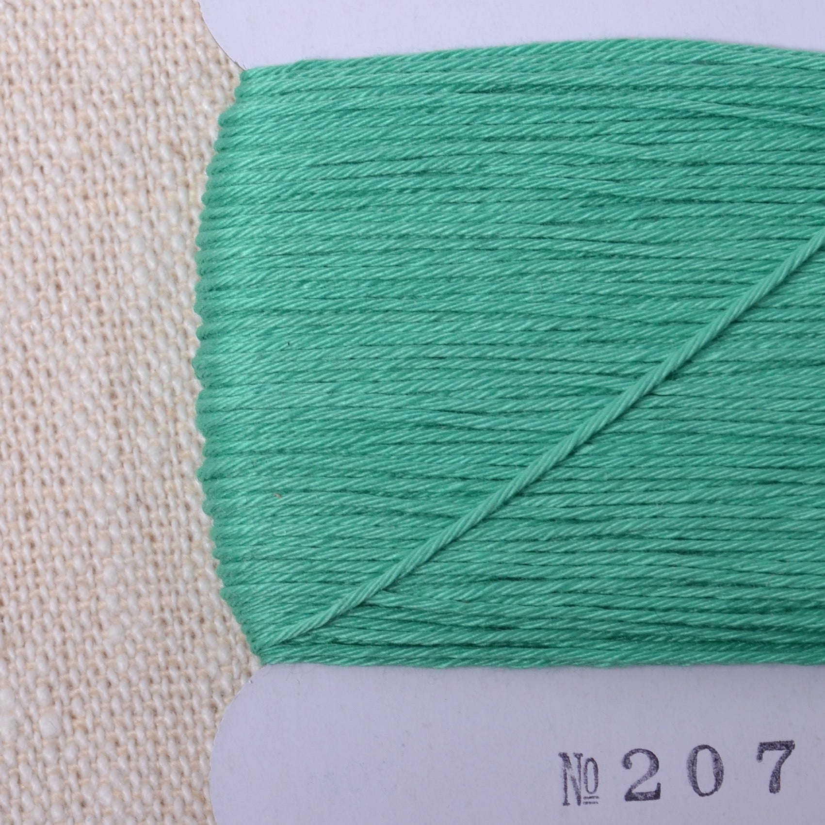 mint green daruma thread