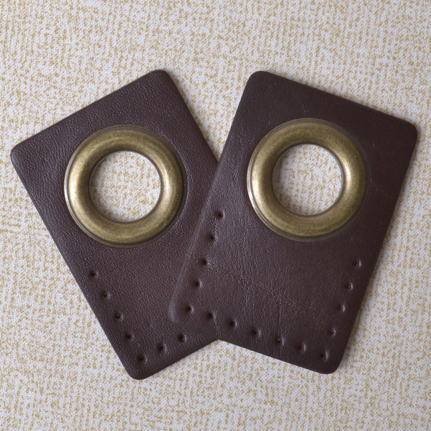 Pair of Leather Tabs with Grommet