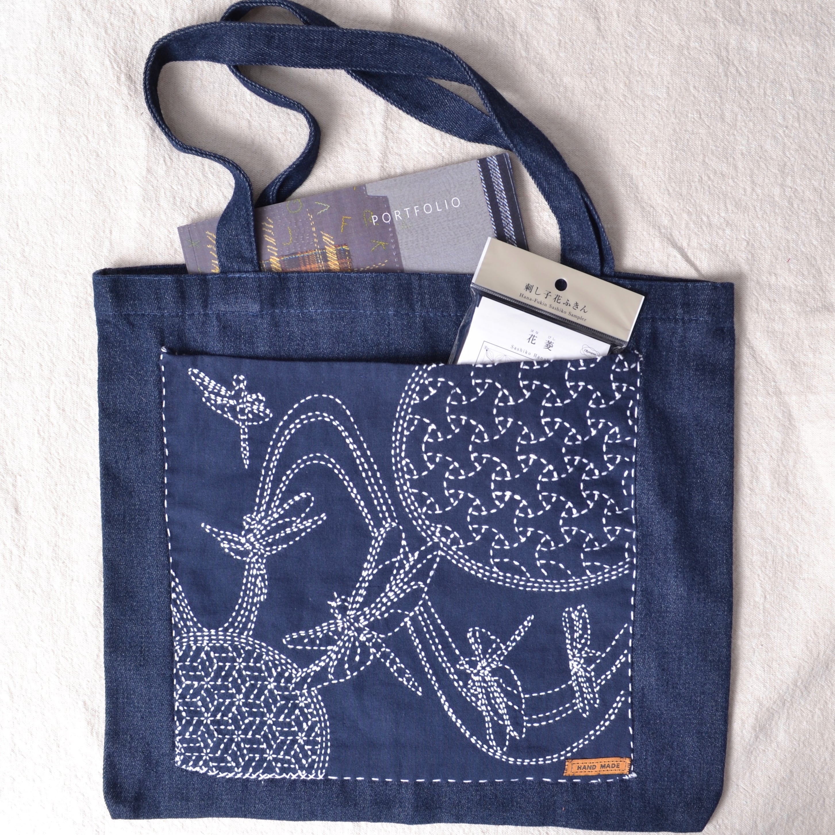 sashiko sampler used for pocket on a denim bag