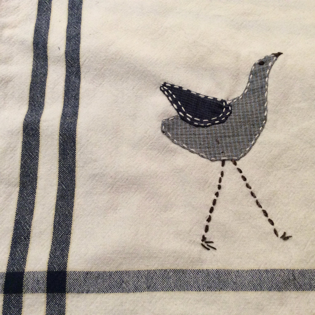bird applique and stitching