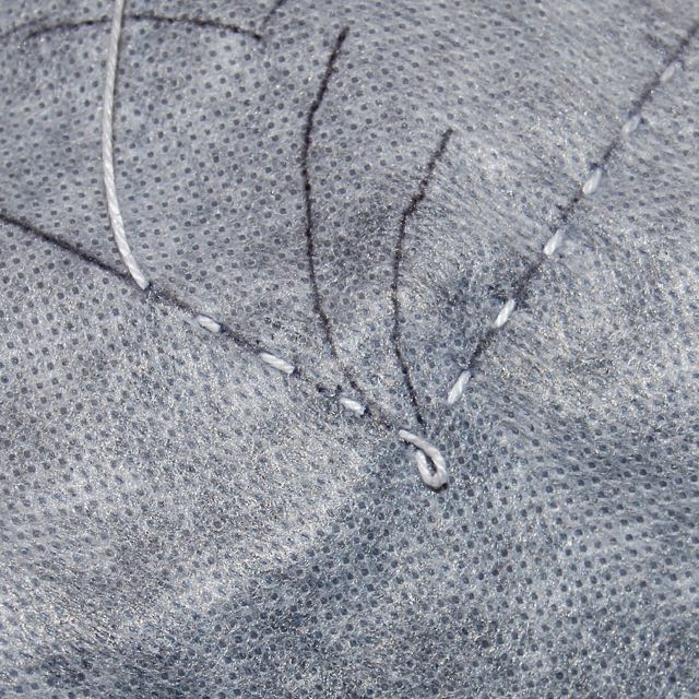 leaving some slack thread on the back of your sashiko stitching