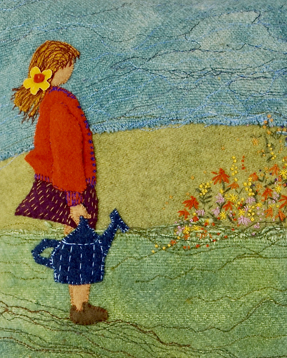 over-dyed wool and hand painting , applique,  embroidery and stitching cropped piece of Girl with watering can by Su Fletcher