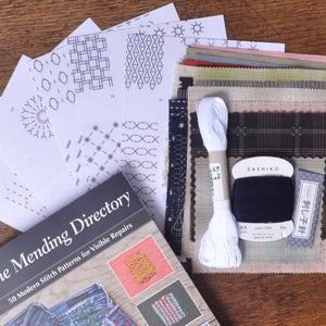 the book and an envelope of re-usable iron-on patterns 