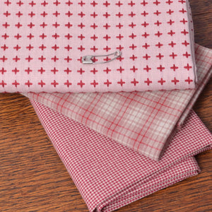 Bundle of three fat quarter pieces of yarn-dyed cotton fabric suitable for&nbsp;piecework, quilting, appliqué, clothing, and other sewing projects. 