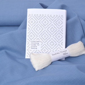 cornflower blue cotton fabric with sashiko pattern and nthread
