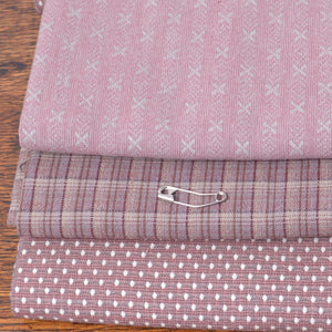 Yarn dyed 100 percent cotton fabric in mulbeery wine tones

