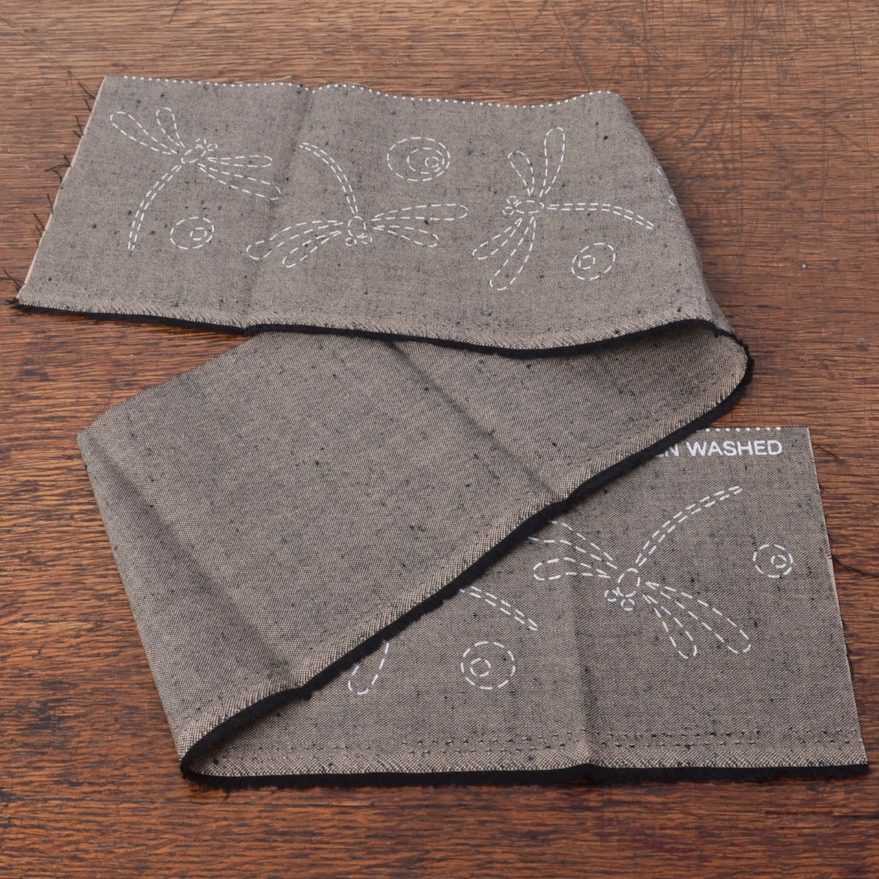Bebe Bolds Dragonflies On Water pattern printed on Tsumugi cotton fabric
