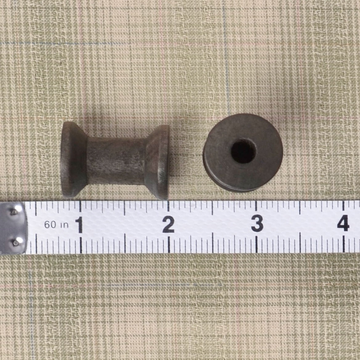 4 small wooden spools  (1 1/8" X 3/4")