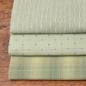 Bundle of three fat quarter pieces of yarn-dyed 100% cotton fabric