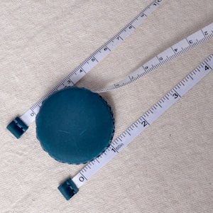 teal tape measure