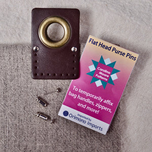 Flat Head Purse Pins showing flat head side of pins holding leather bag attachment in place