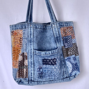 Example of denim tote bag blank stitched with boro inspired patching and sashiko stitching 