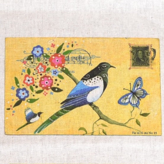bird on branch with flowers and butterfly postcard fabric patch