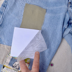 Showing how to peel backing on Dissolvable Stick & Stitch Transfer Patterns "Geometrics"