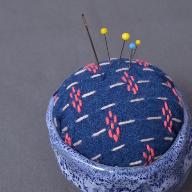 sashiko stitched cushion  cover in pin bowl