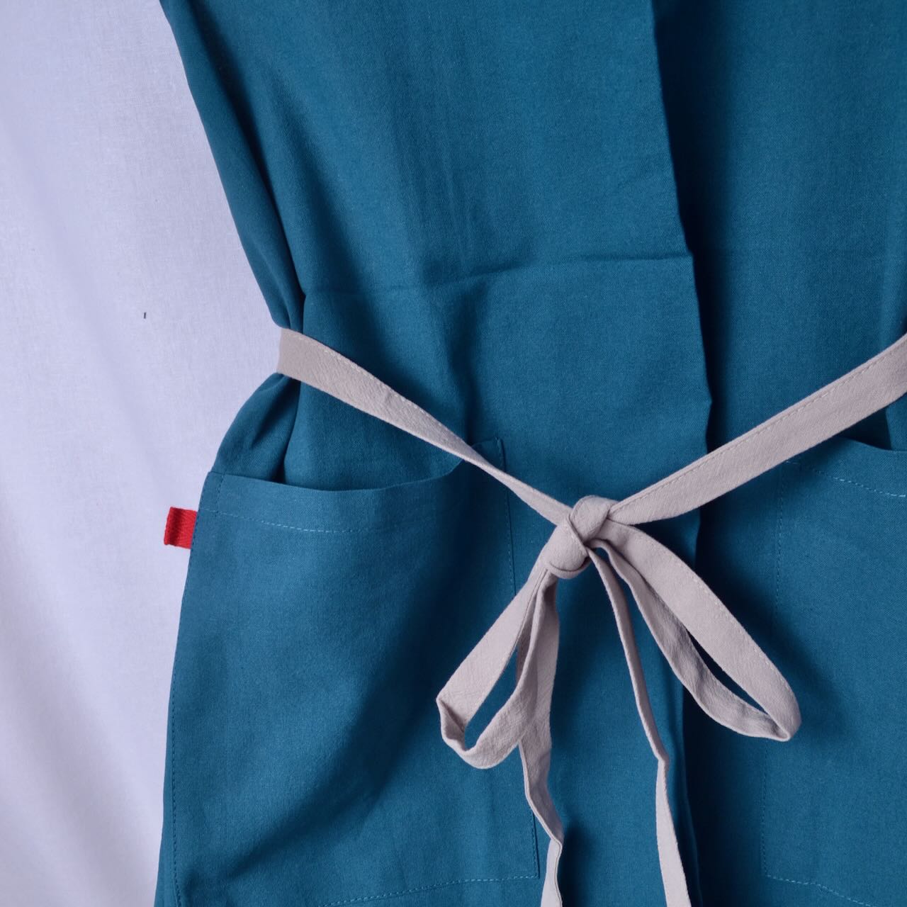 Blue Cotton Apron suitable for studio or kitchen use