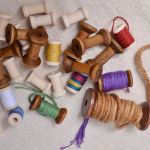 wooden spools for sewing and craft organisation