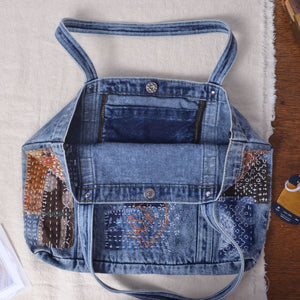 showing inside of boro style stitched denim shoulder bag