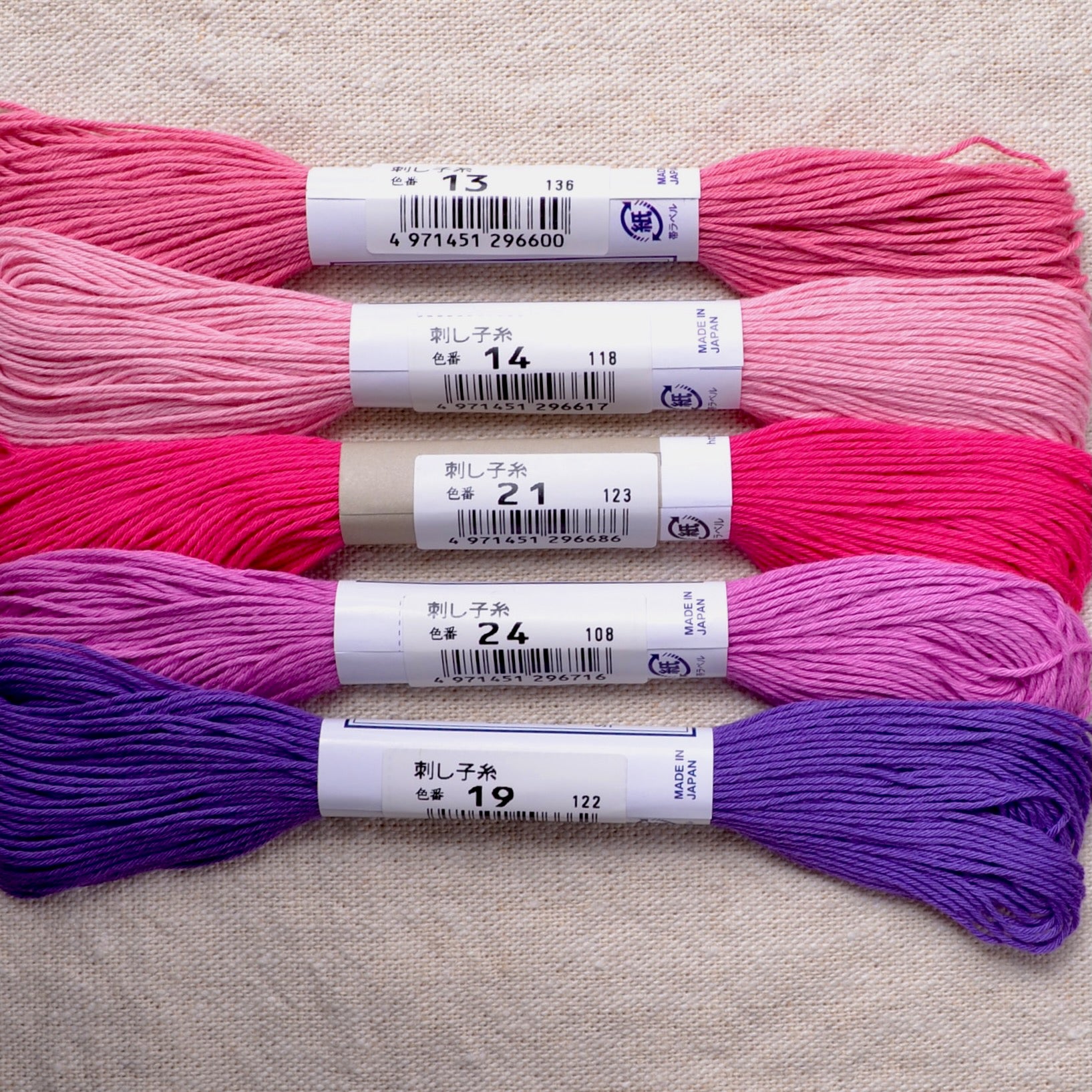 pink sashiko threads, and a purple