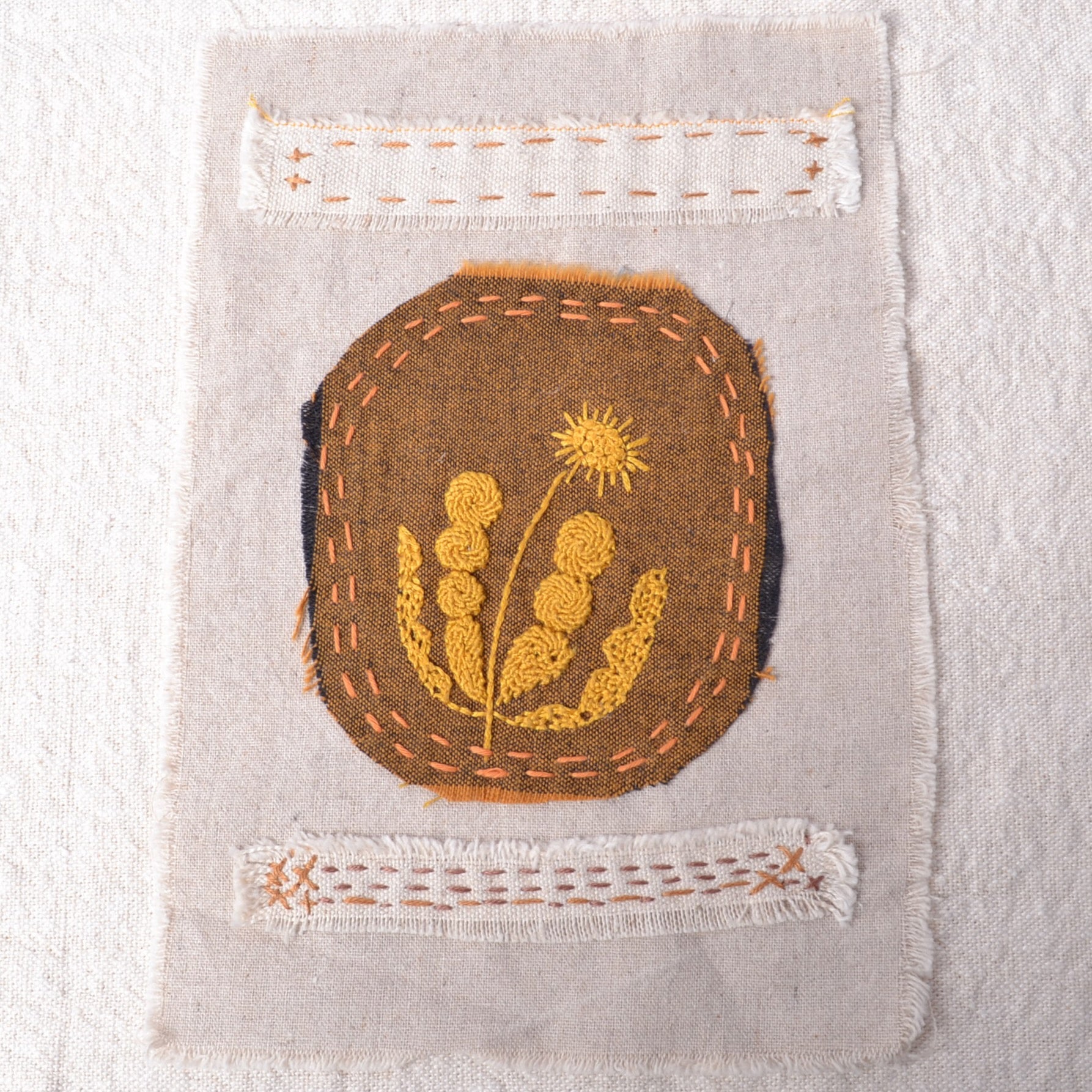embroidery  backed on washed linen/cotton fabric patch