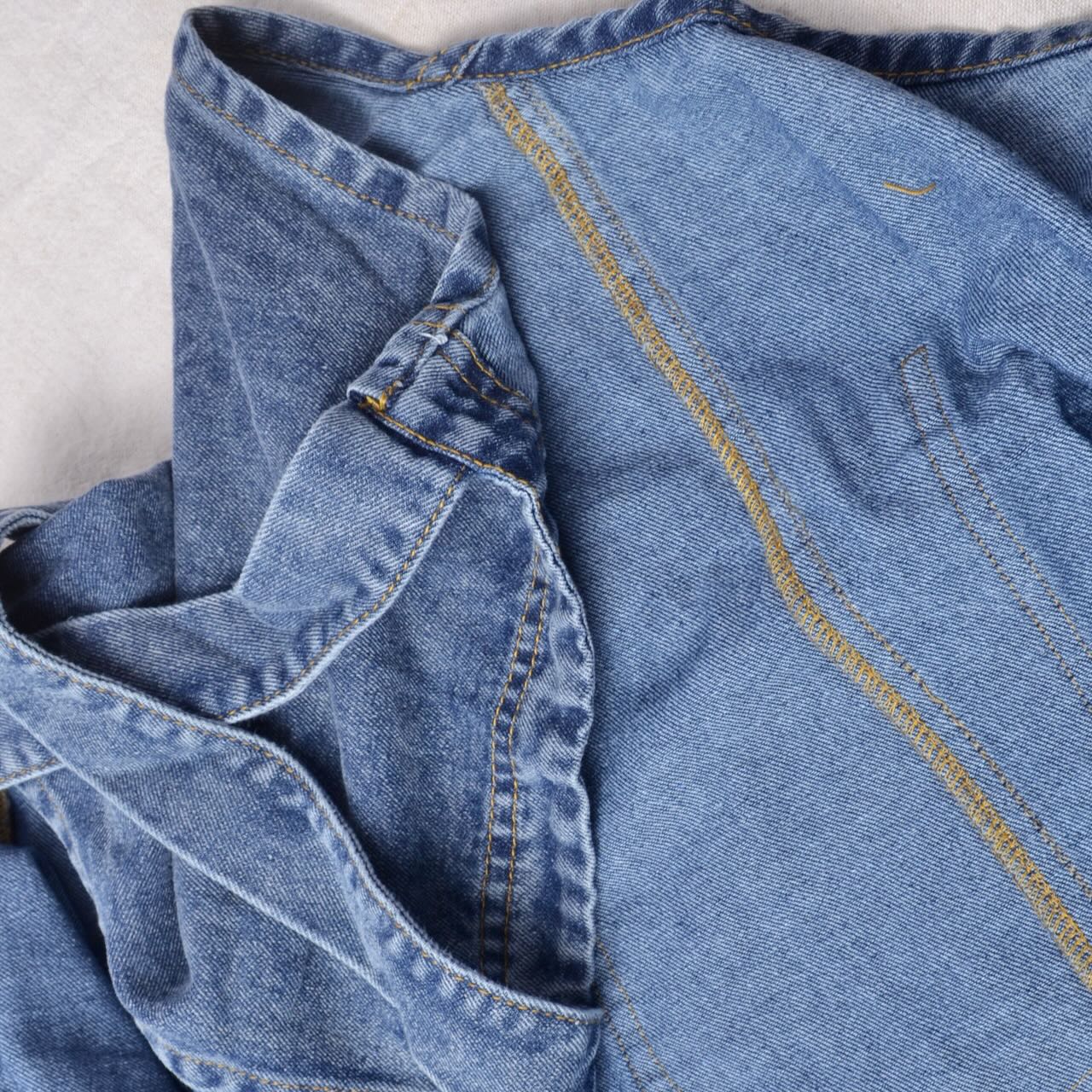 showing inside finishing on denim apron blank