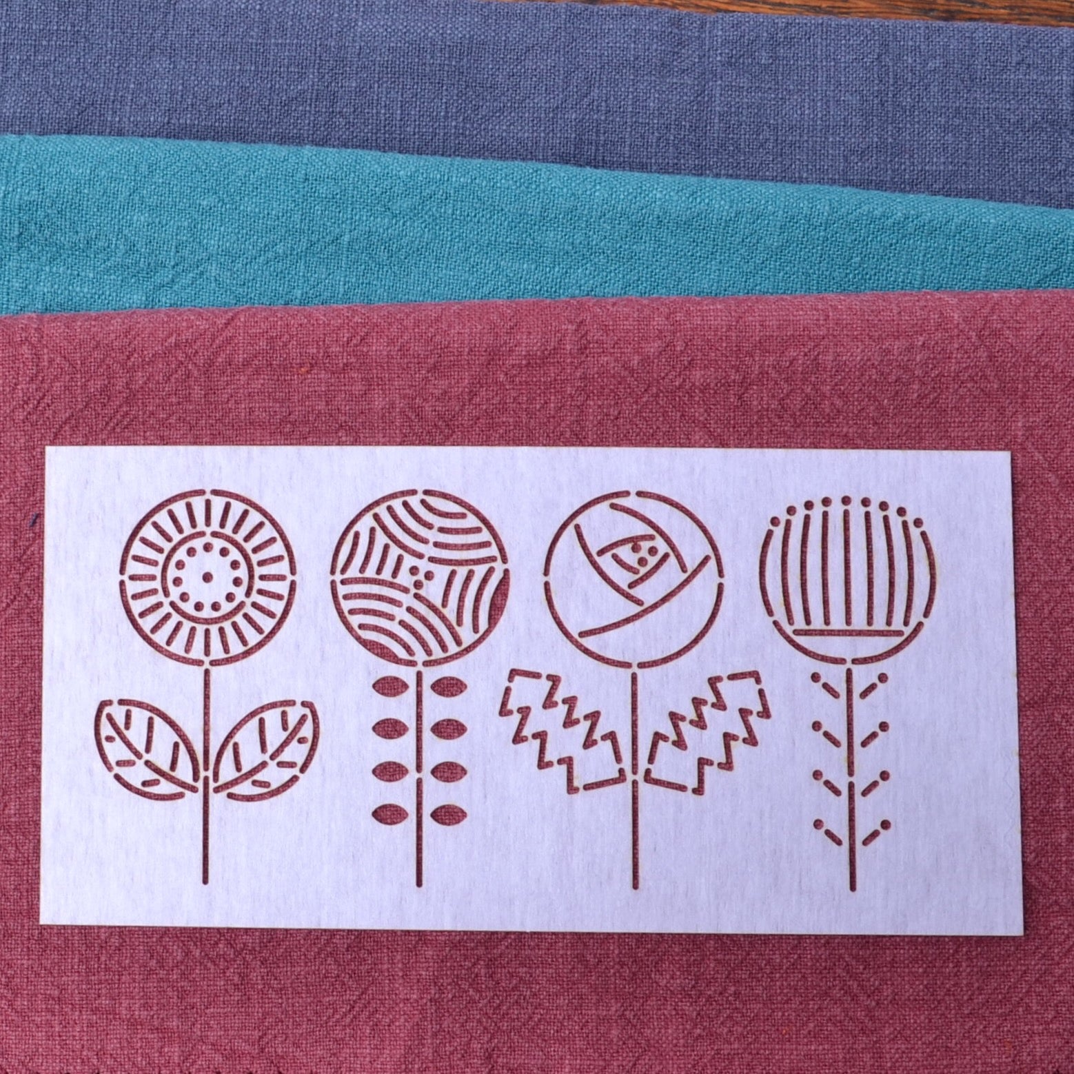 embroidery stencil, 4 stylised small flowers