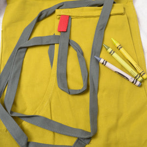 mustard and olive apron for kitchen or studio use