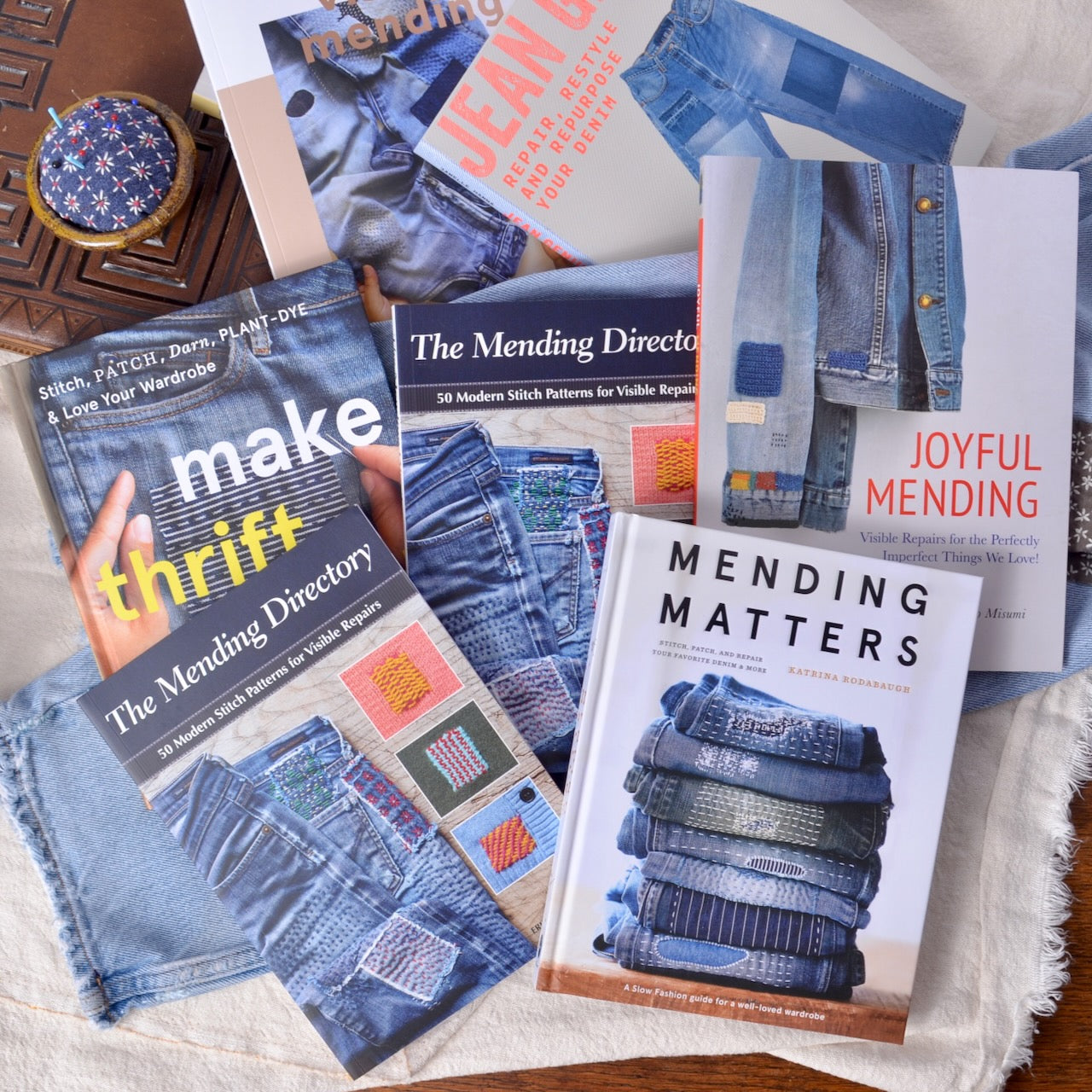 collection of books about mending clothing, especially denims