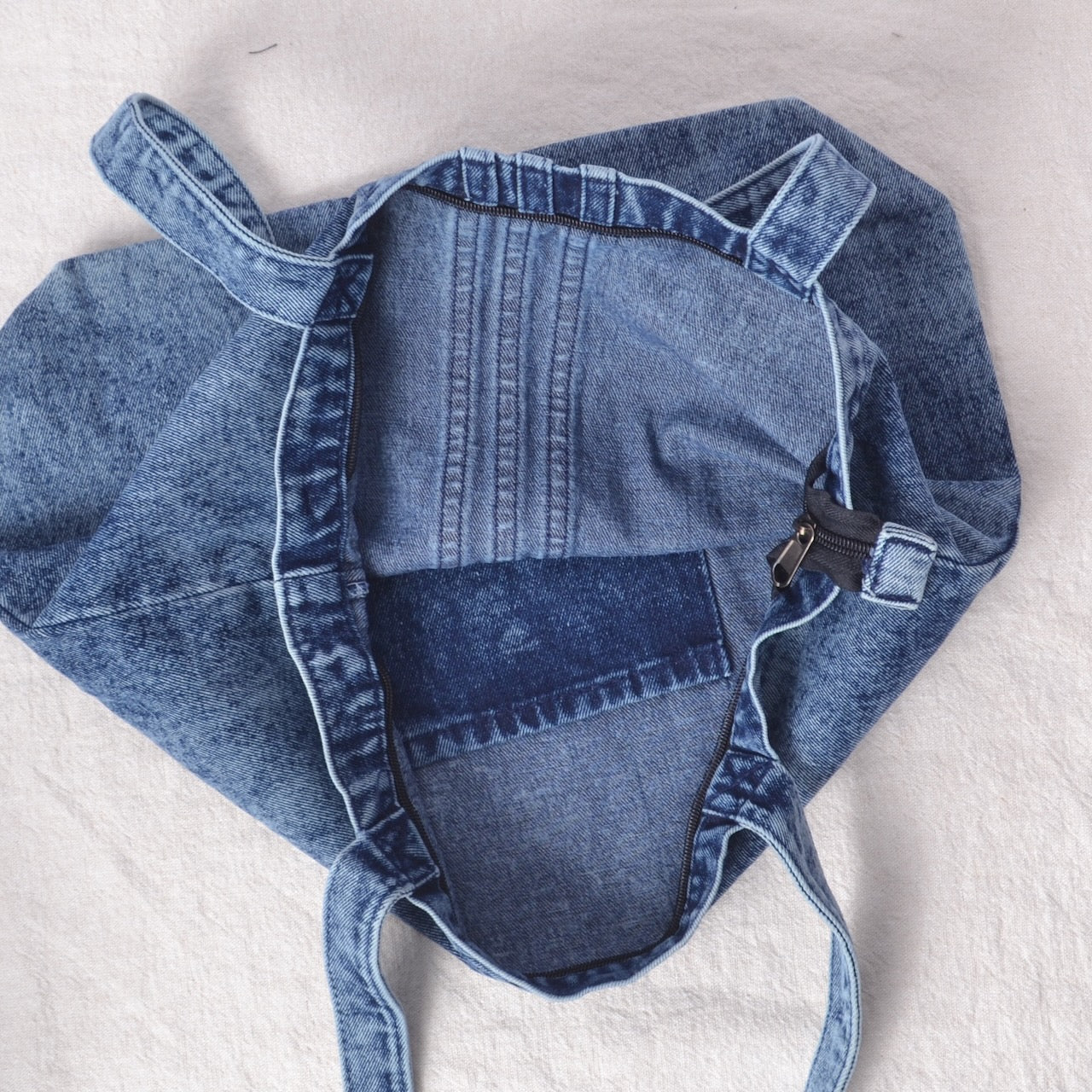 showing inside of denim bag