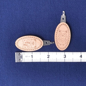 needle threader with tape measure for size