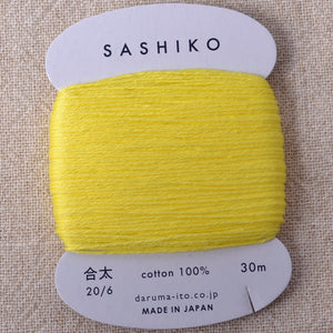 Daruma bright yellow sashiko thread