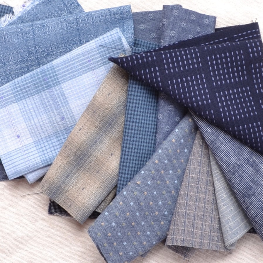 small cuts of blue dyed yarn cotton sewing fabrics