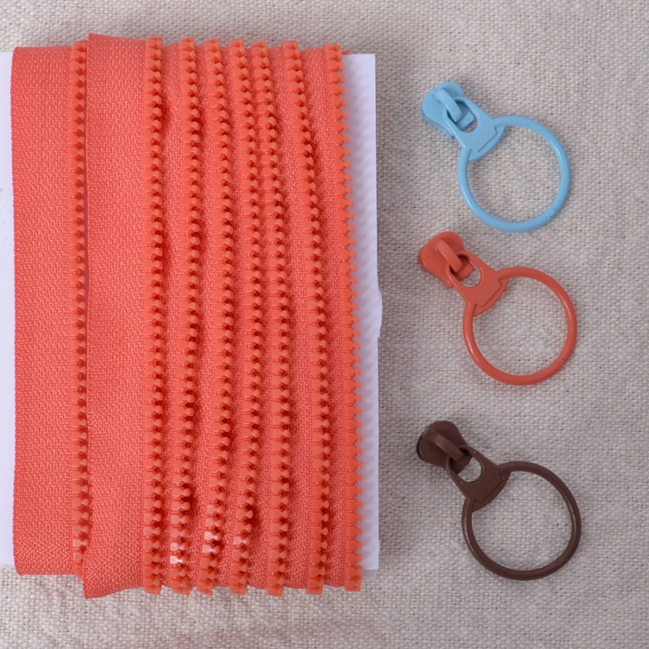 Single Sided Zipper Tape with 3 Metal Pull Tabs, Coral