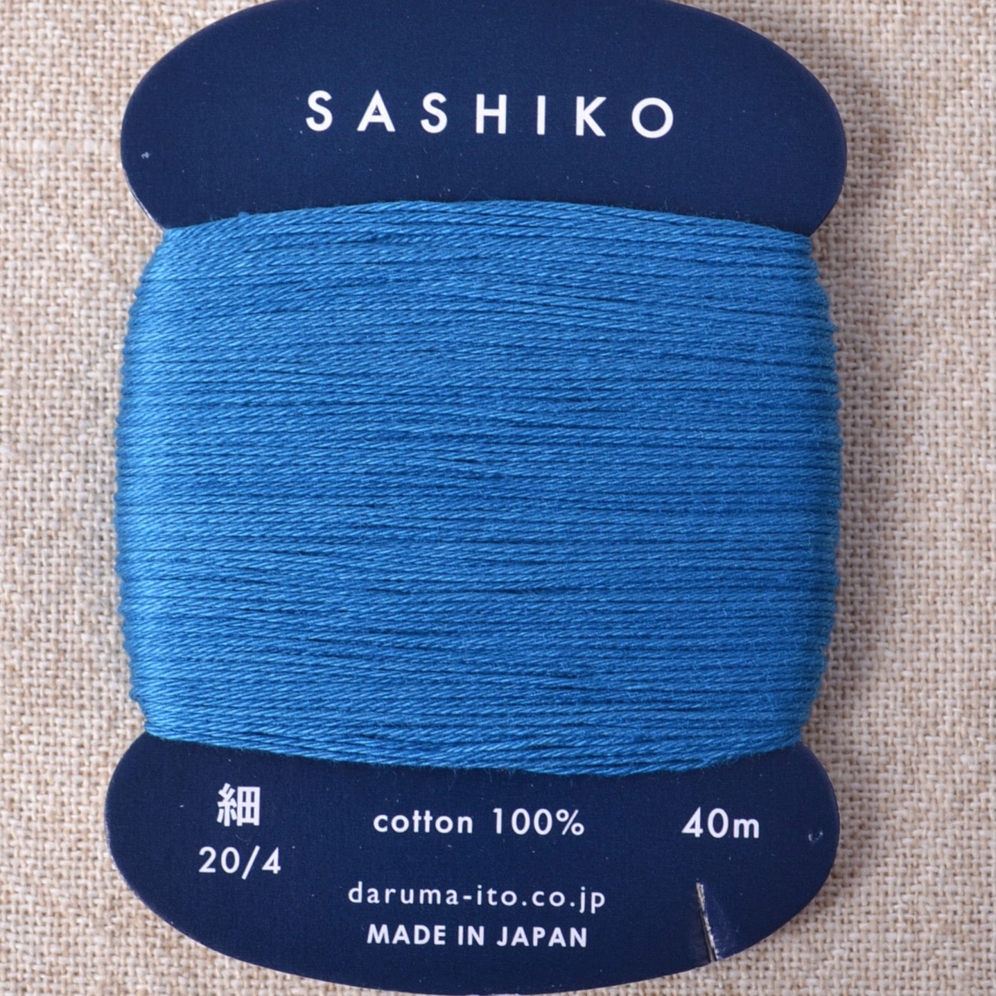 Daruma Sashiko Thread, Blue #224 - A Threaded Needle