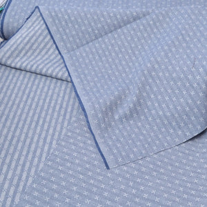 blue dyed yarn cotton fabric for sewing showing both sides