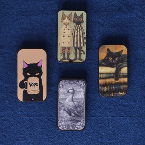 various sewing notion tins