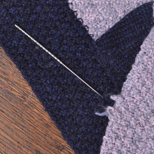 tool for repairing snags on knit wear called snag repair needle