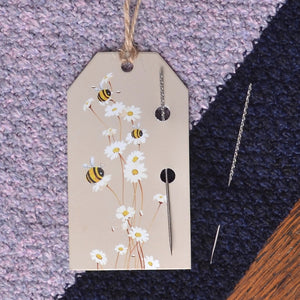 Showing  snag repair needle for repairing snagged threads on knitwear,  packaged without plastic