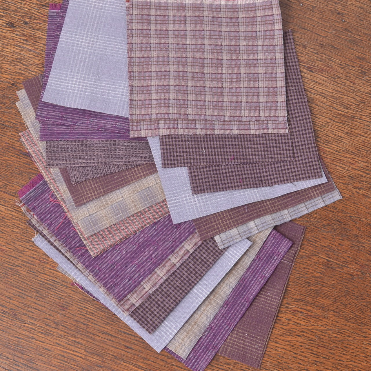 Assorted purple yarn dyed fabric, small cuts
