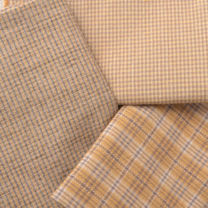 Japanese  yarn-dyed cotton fabrics, warm earthy yellows