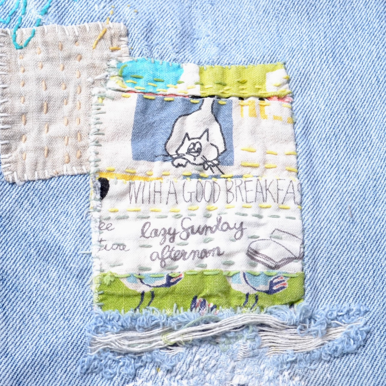 Example of visable mending patch on jeans