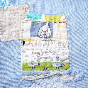 Example of visable mending patch on jeans