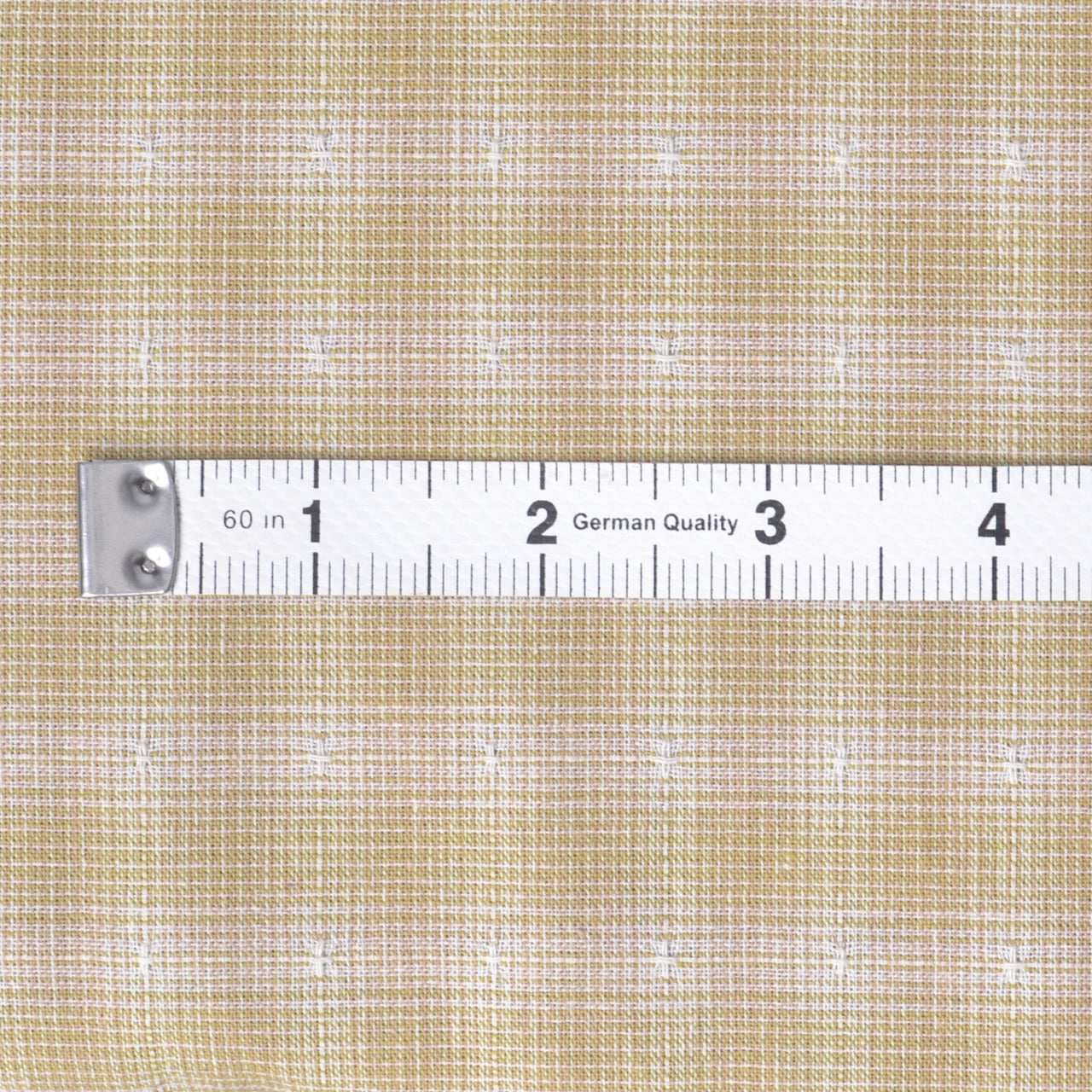 Japanese Yarn-Dyed Fabric with a tape measure to show size of plaid