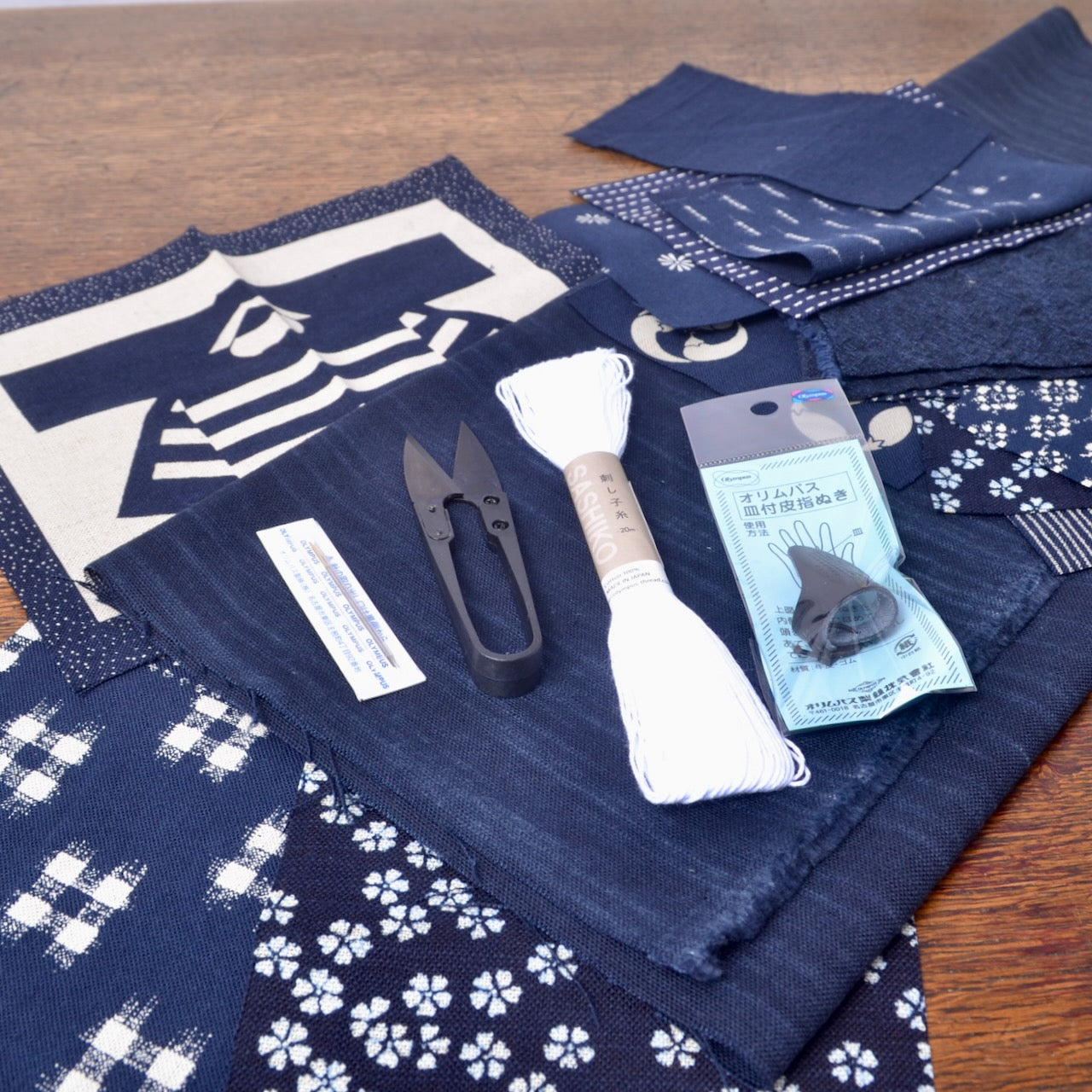 Boro kit including thread snips, thread, needle and thimble