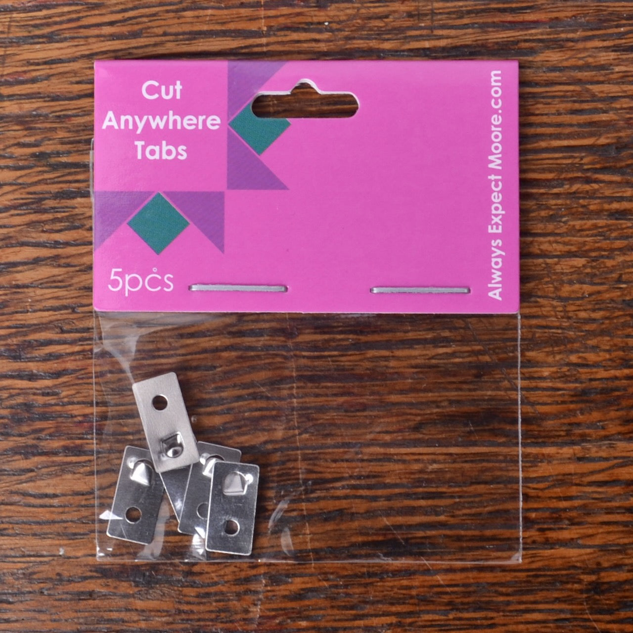 Packaging of 'Cut Anywhere Tabs' with five tabs 