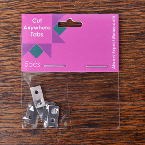 Packaging of 'Cut Anywhere Tabs' with five tabs 