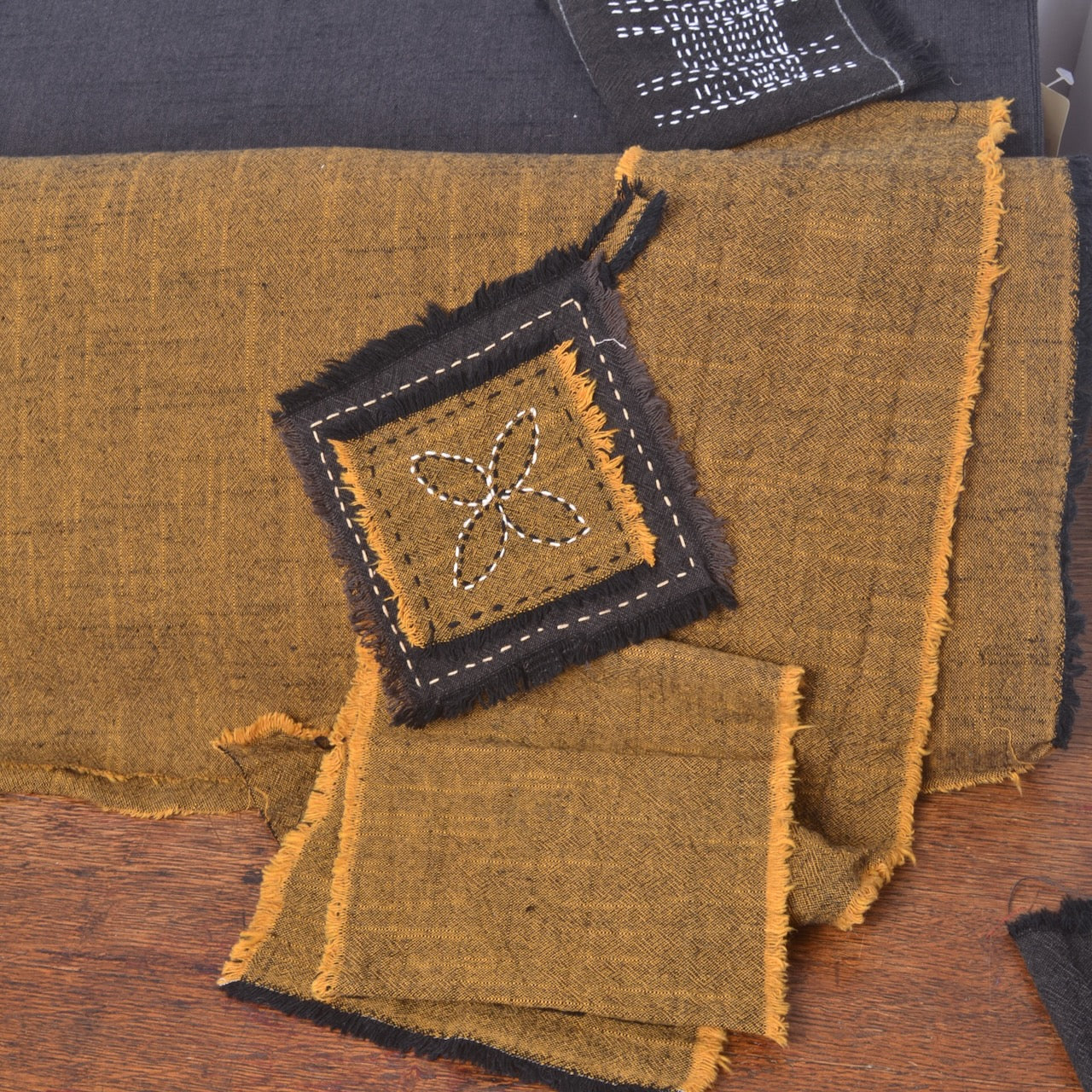 sample of Japanese Yarn-dyed Slub Cotton Cloth, Ukon unwashed, washed and stitched and washed (machine washing)