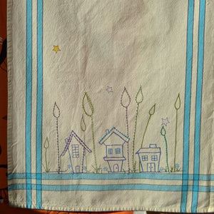 Fabrico pens drawing and stitching on kitchen towel blank