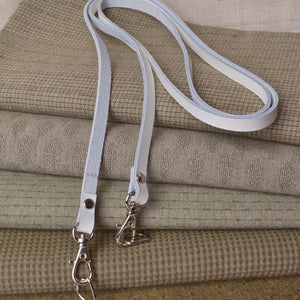 white bag strap with silves hardware