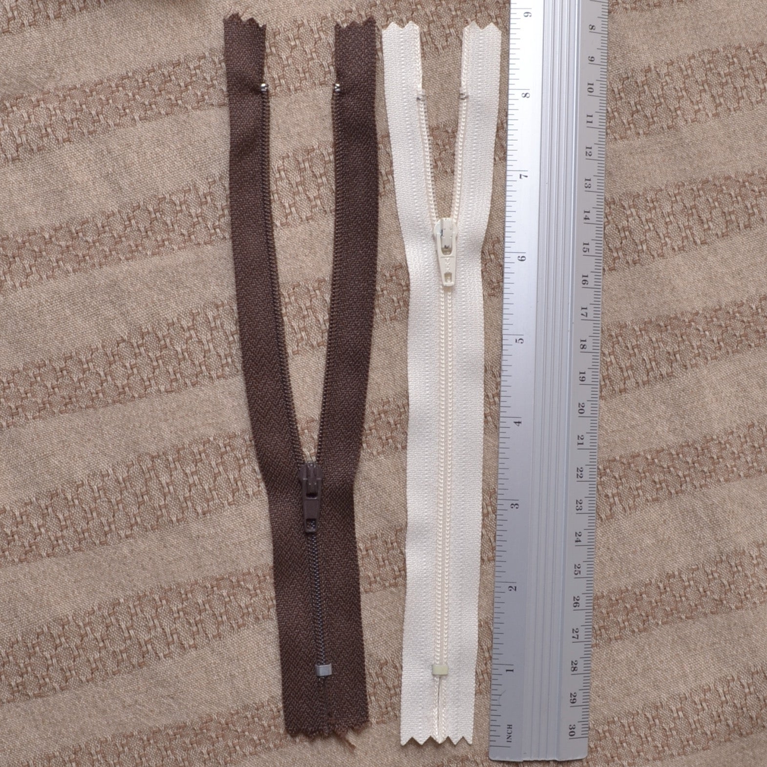brown and off white seven inch sewing zippers